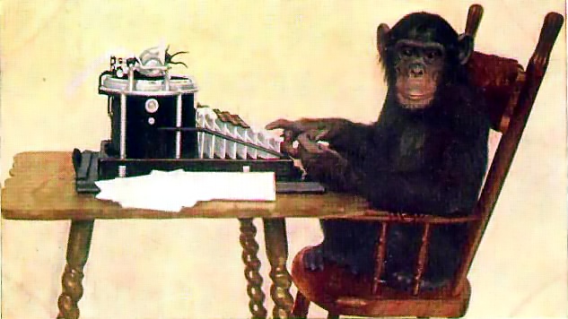 monkey in a chair with a typewriter